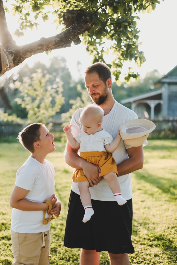 A father with his children outdoors
